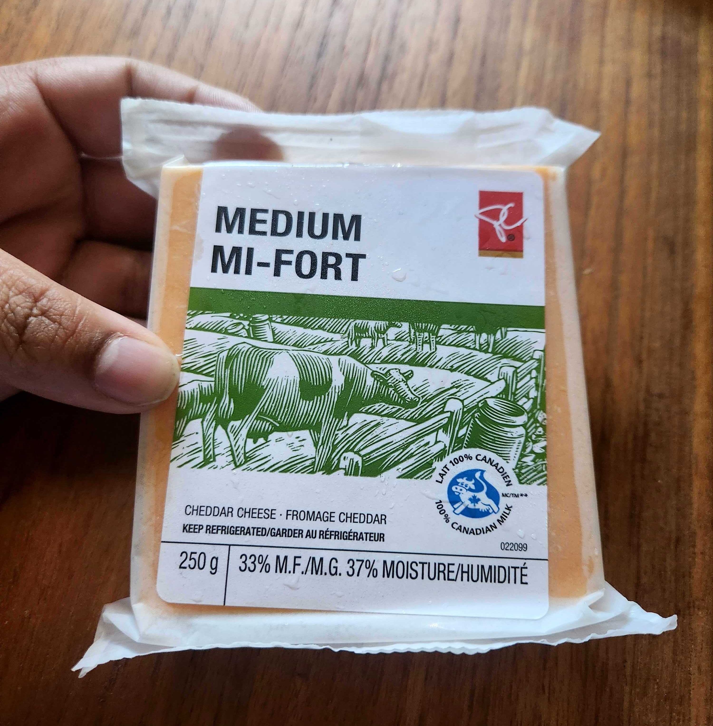 250 grams of President's Choice medium cheddar cheese from No Frills for $7.79.