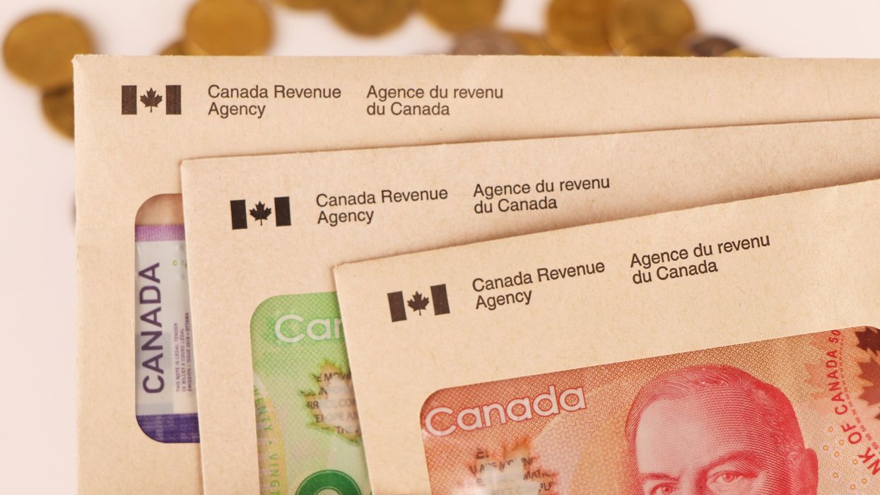 3 Canada Revenue Agency envelopes containing Canadian money (illustrative).