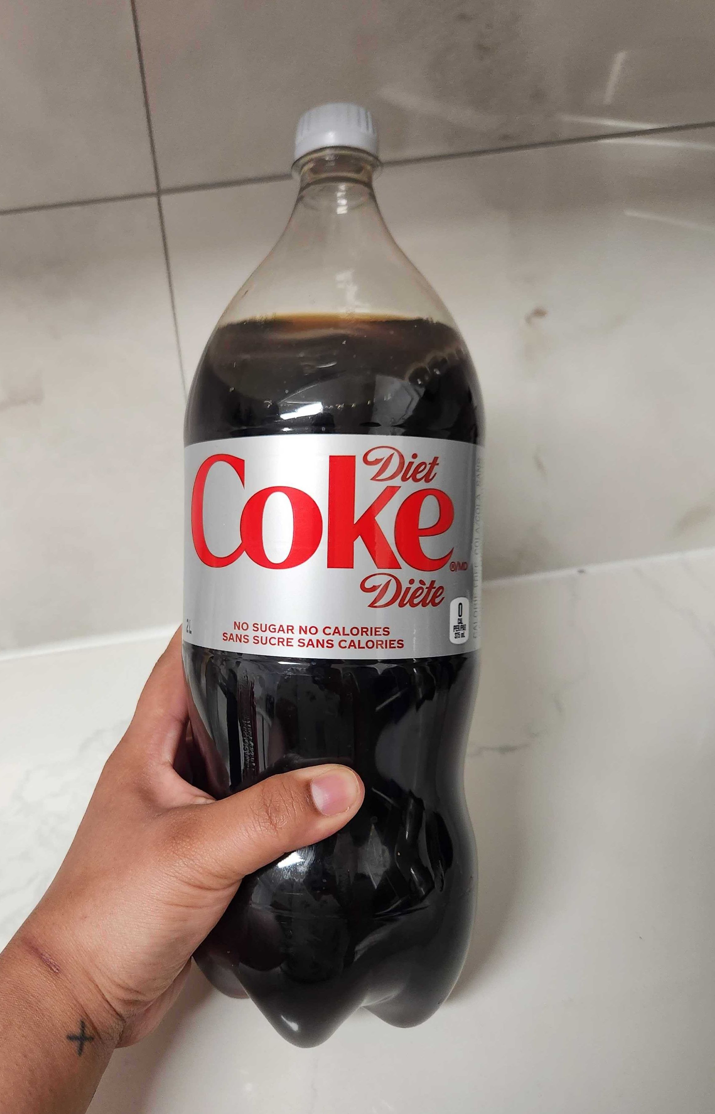 A 2 litre bottle of Diet Coke.