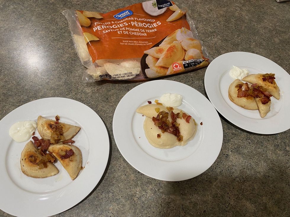 A bag of Great Value Potato & Cheddar Flavoured Perogies and three plates of cooked pierogi.