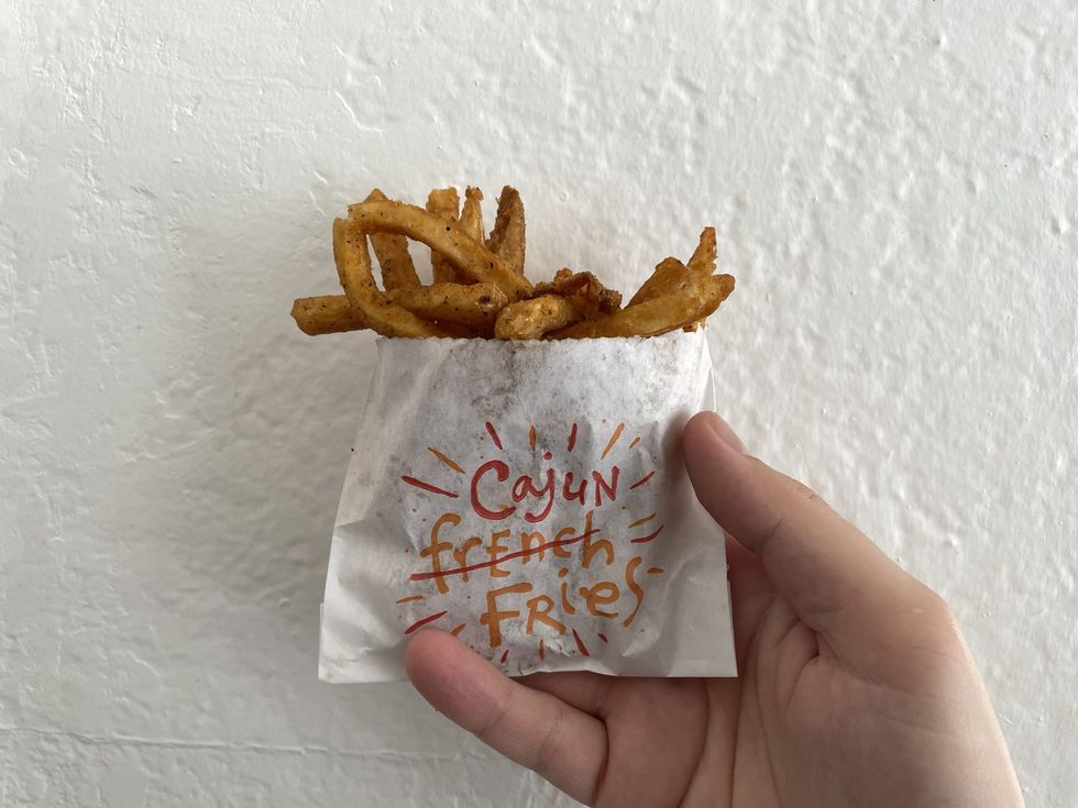 A bag of Popeyes fries.