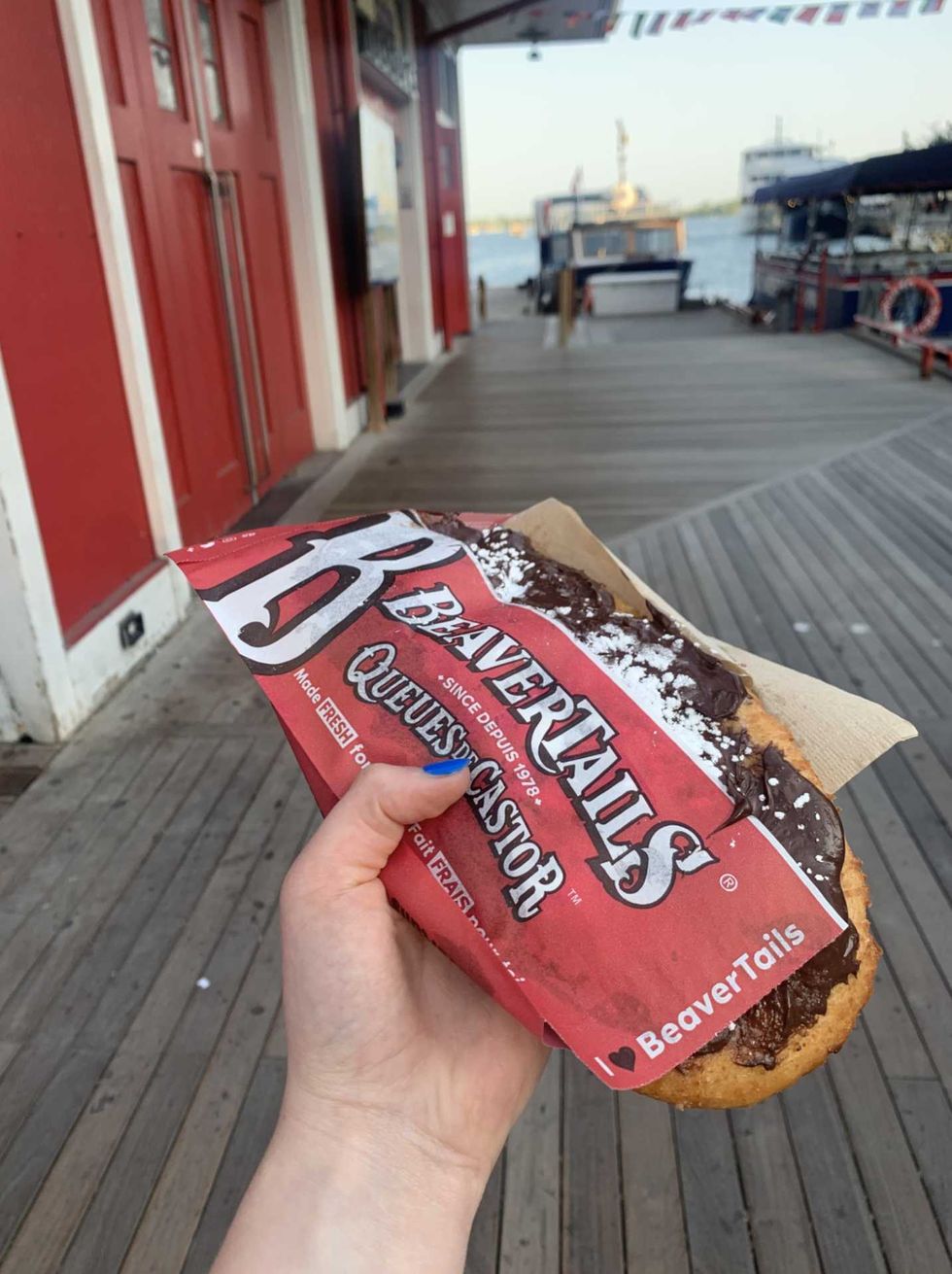 A Beaver Tail pastry covered in chcolate spread.