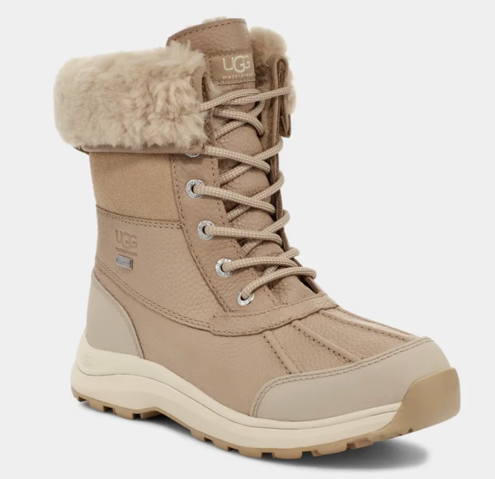 A beige UGG winter boot.