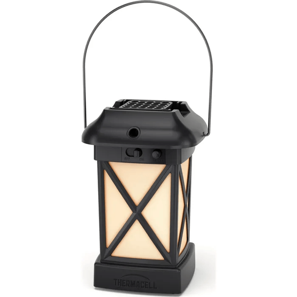 A black and yellow camping lantern with the Thermacell logo on the base.