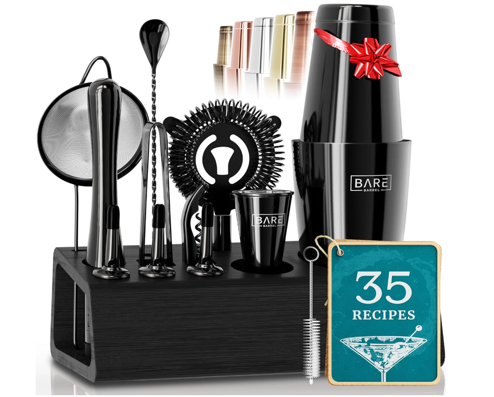 A black cocktail set with various tools to make drinks like a strainer and cocktail shaker.