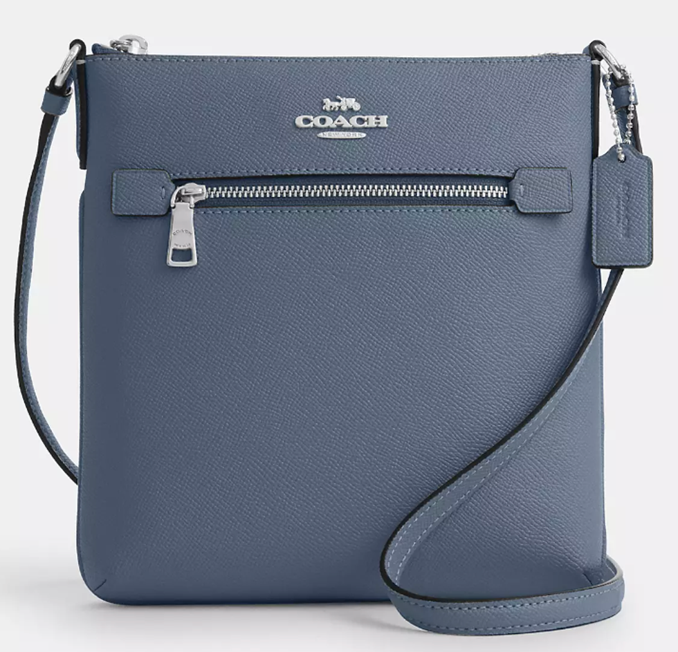 A blue Coach purse.