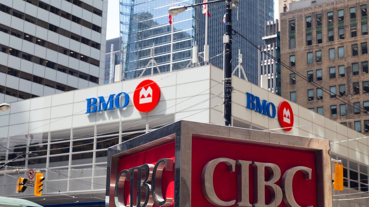 A BMO and A CIBC sign in Toronto's financial district.