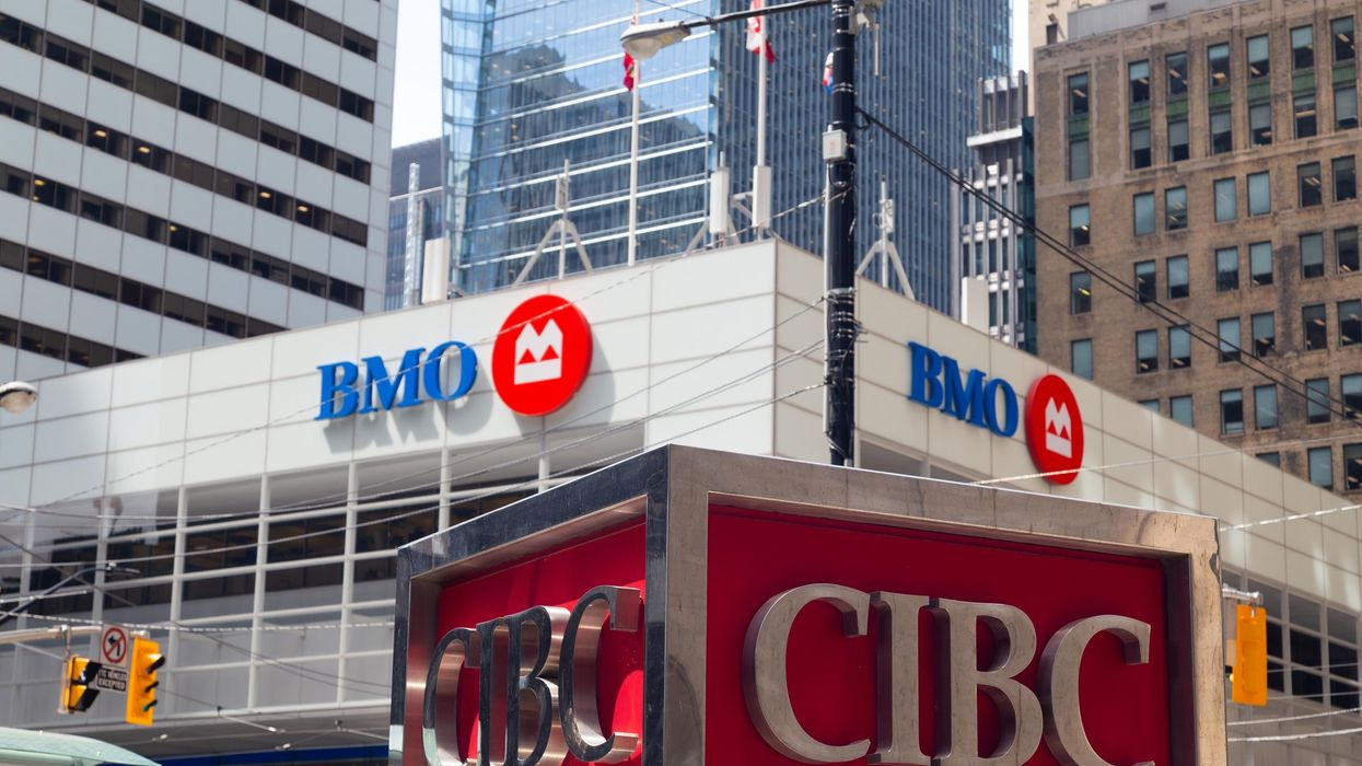 A BMO and A CIBC sign in Toronto's financial district.