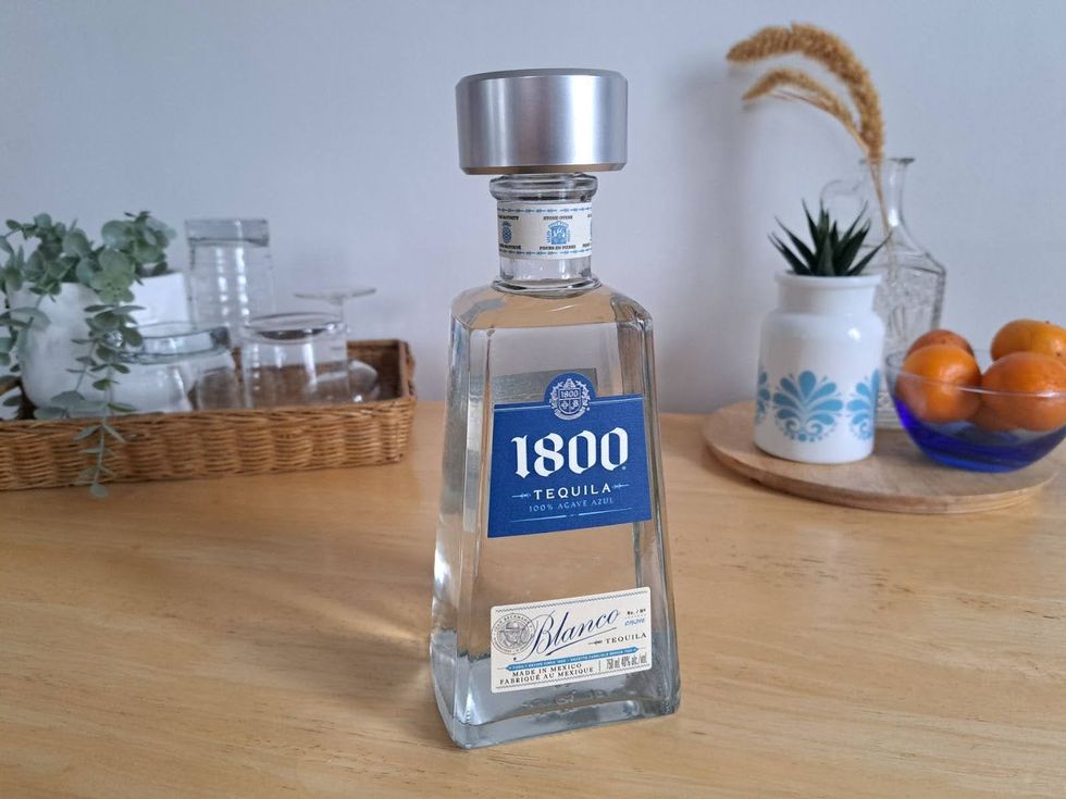 A bottle of 1800 Blanco tequila.