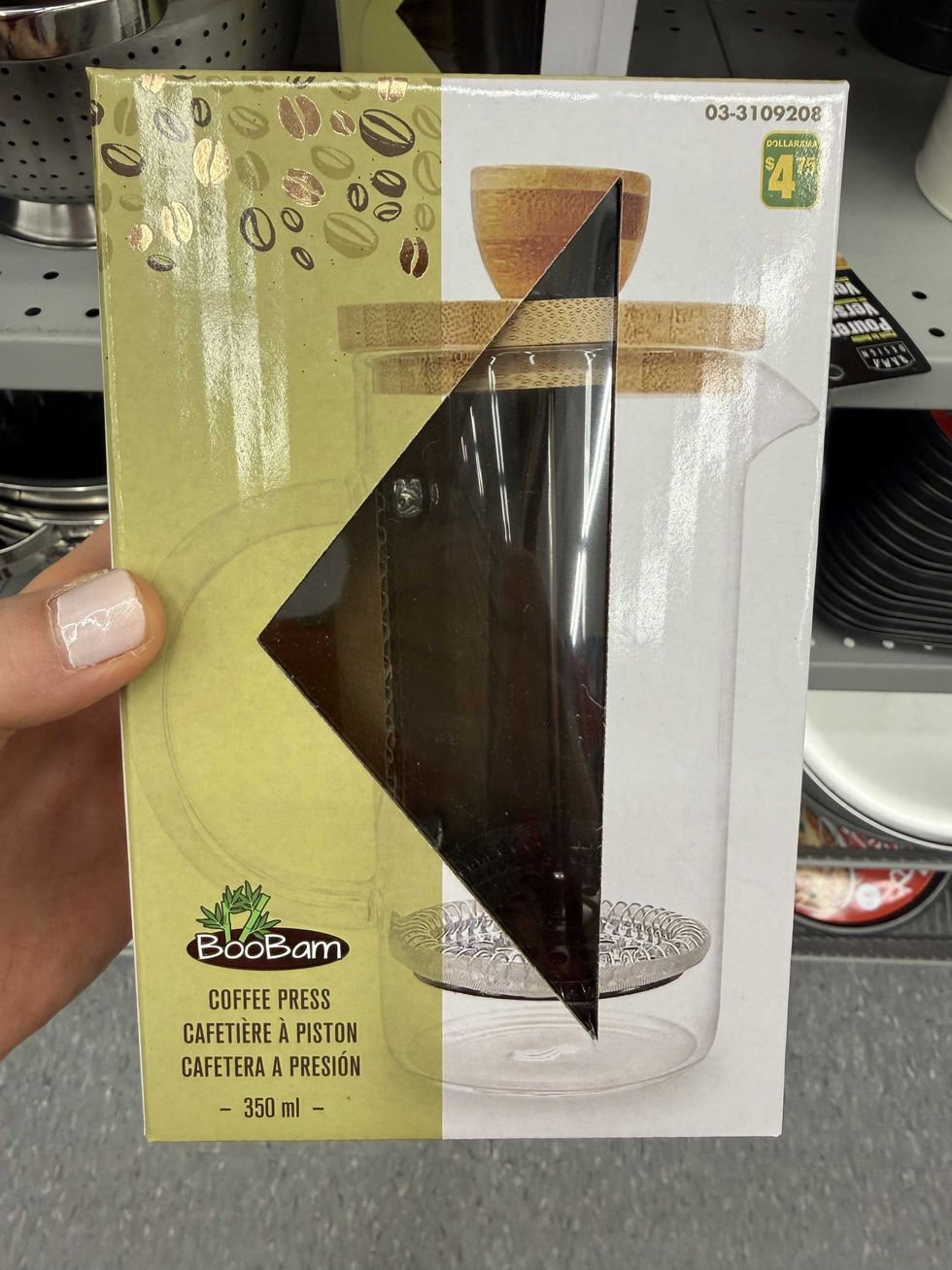 A box with a picture of a coffee steamer on it.