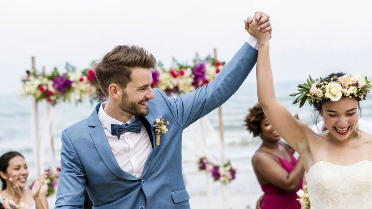 A bride and groom on their wedding day.