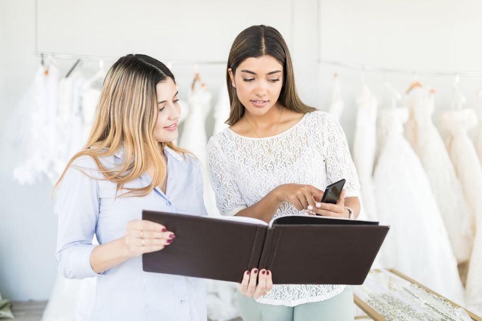A bride-to-be shopping for a wedding dress.