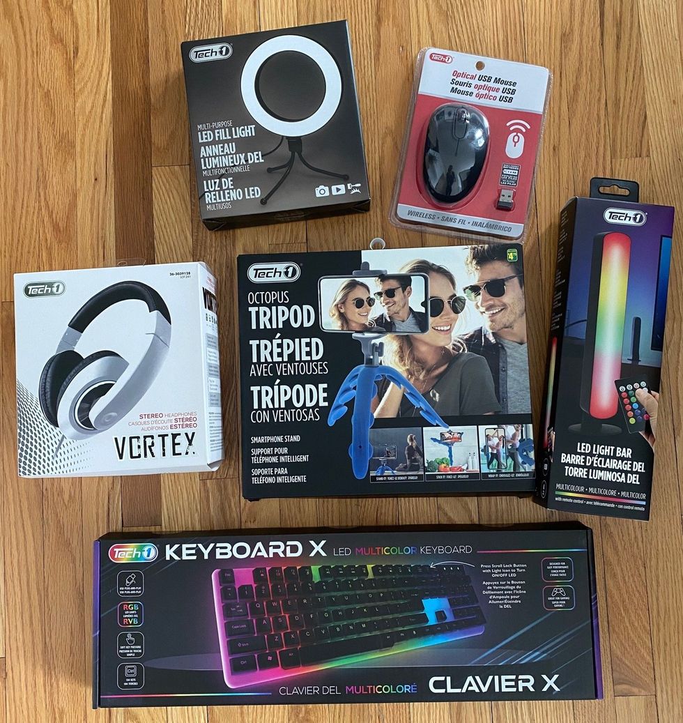 A bunch of boxeed items on the floor.