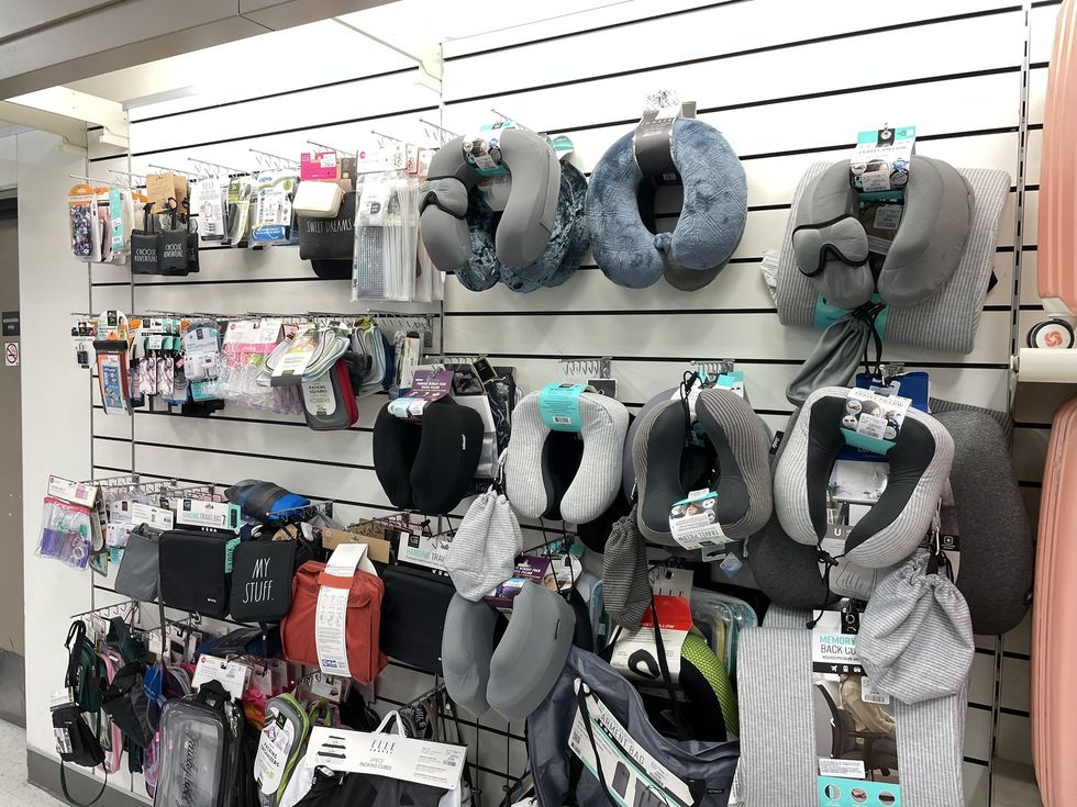 A bunch of travel pillows.