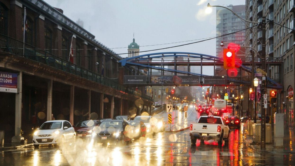 A busy street in the rain.