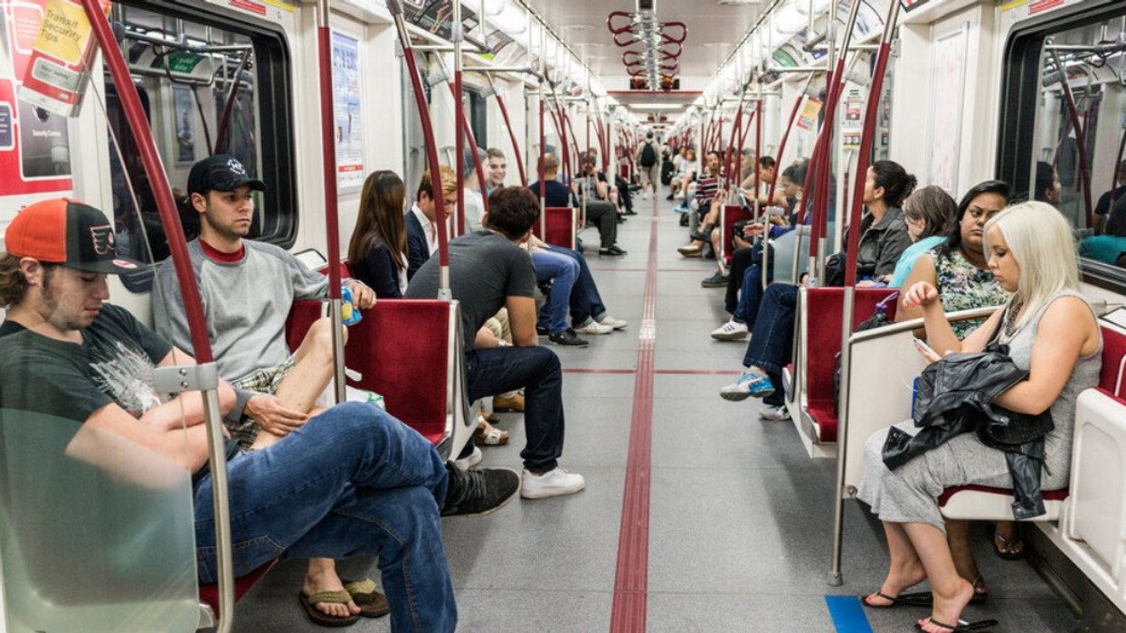 A busy TTC subway car.