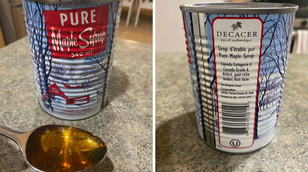 A can of maple syrup and Asymina holding a spoonful of it: Right: A can of maple syrup sitting on a kitchen counter.