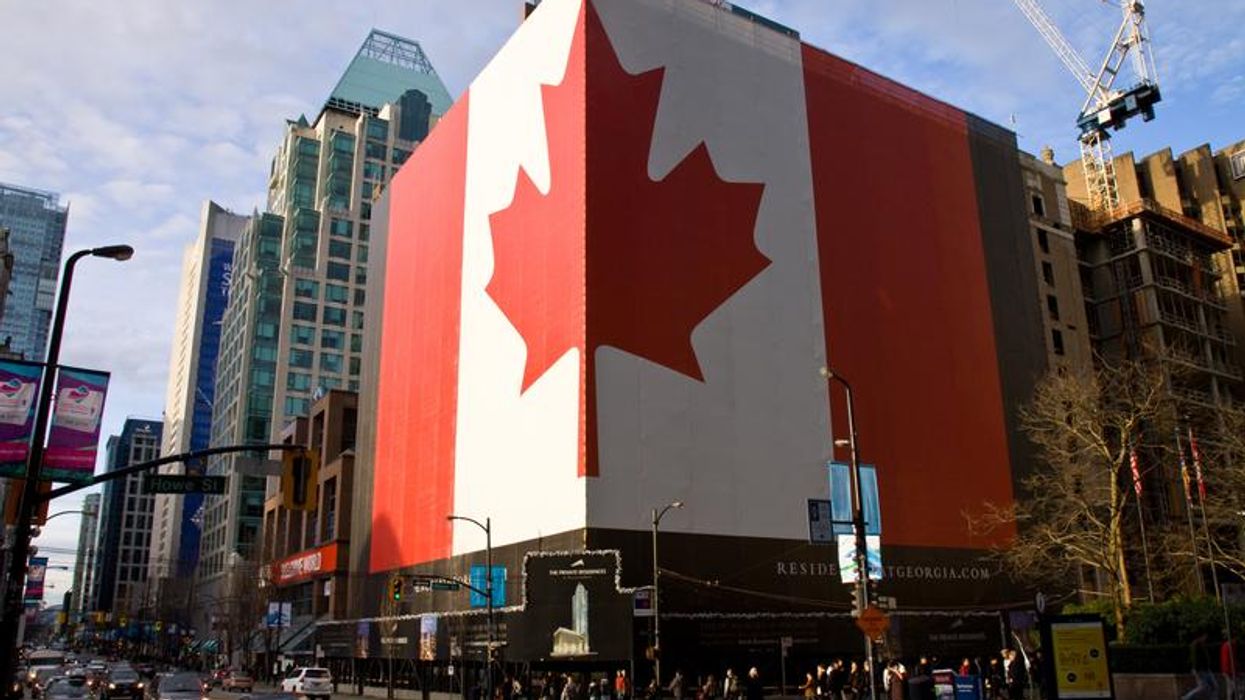 A Canadian flag on a building in Vancouver.
