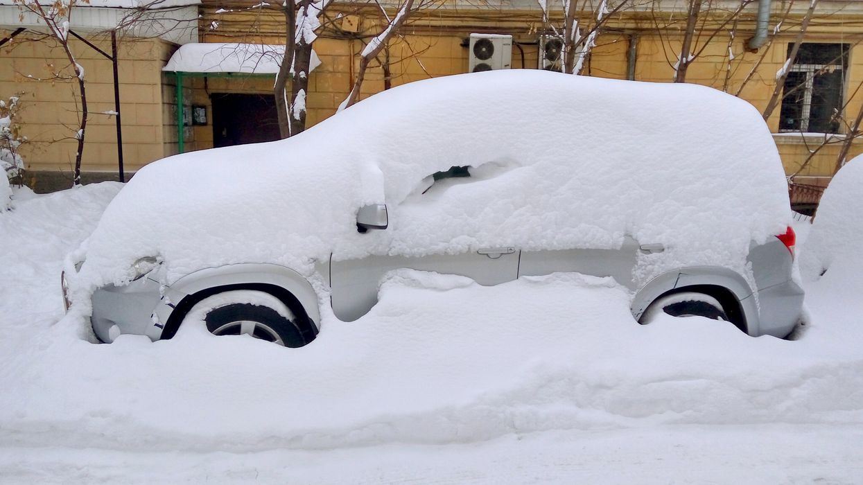 A car covered in snow.