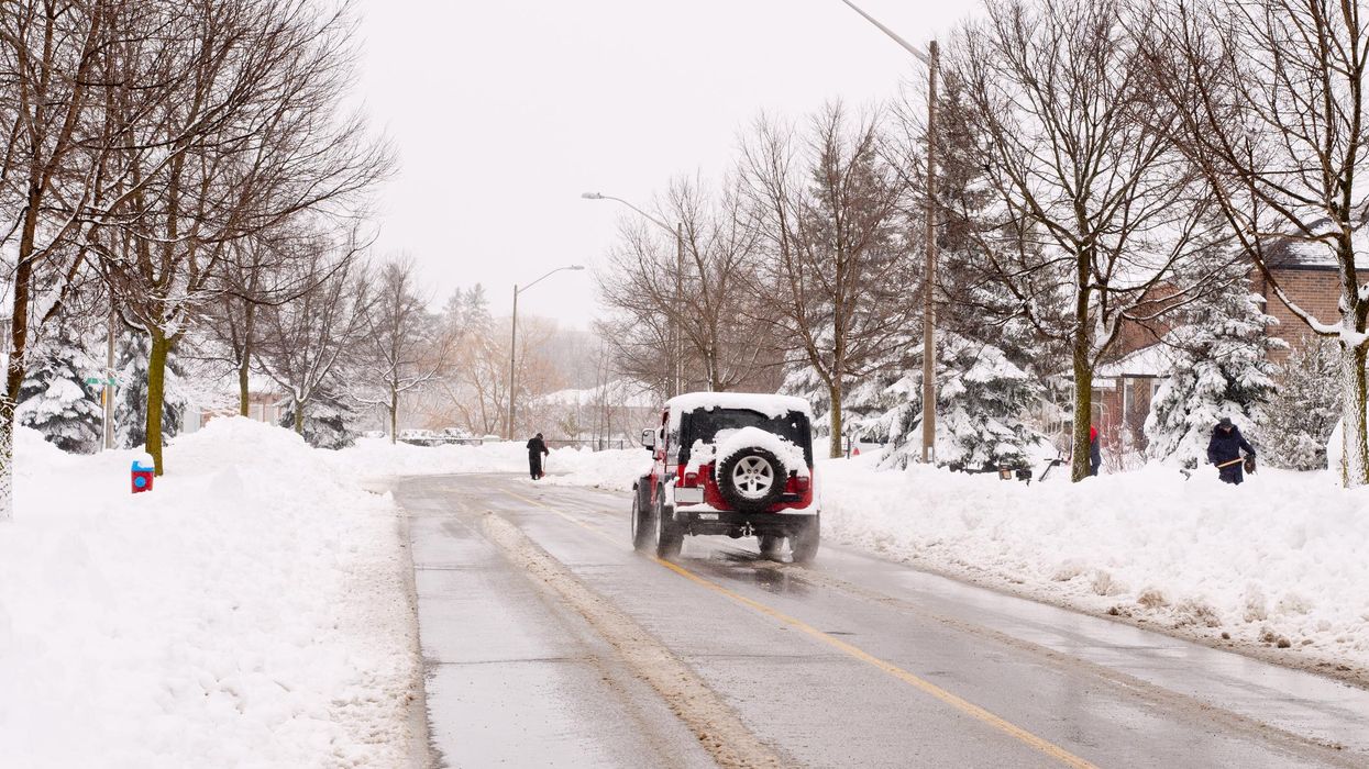 A car driving in the snow.