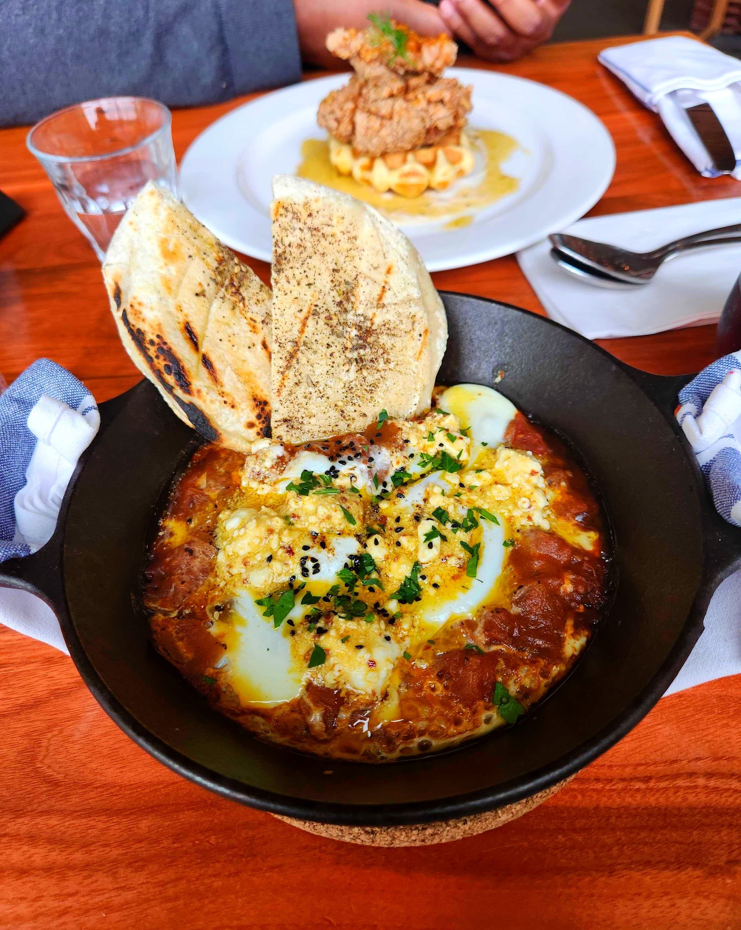 A cast iron skilled with The Shak from Mildred's Temple Kitchen.