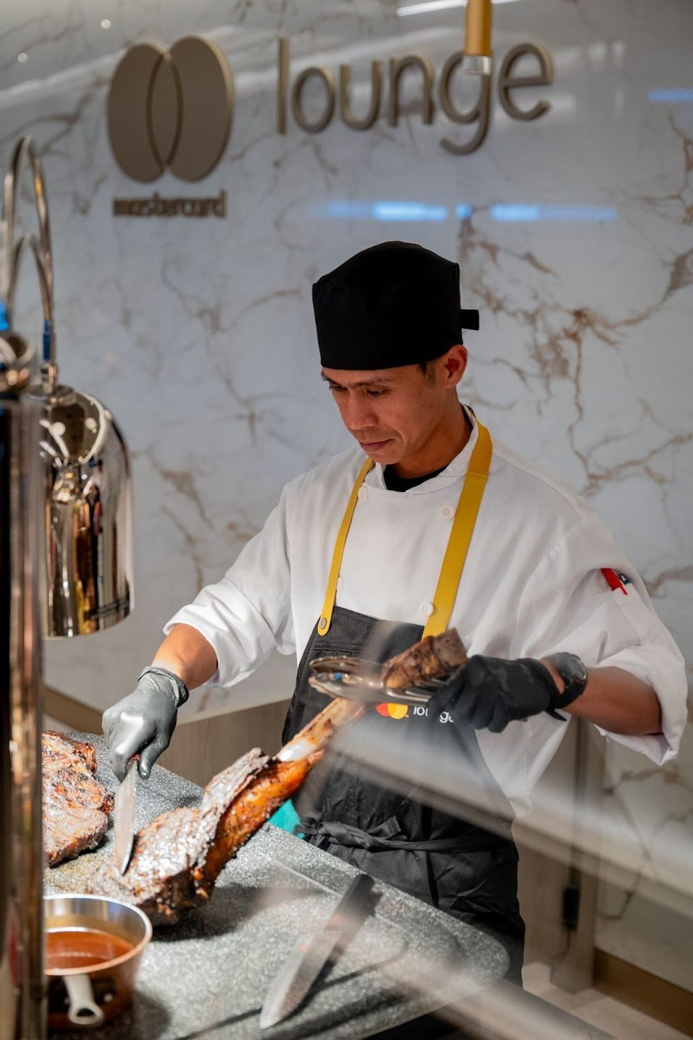 A chef at Scotiabank Arena's Mastercard Lounge.