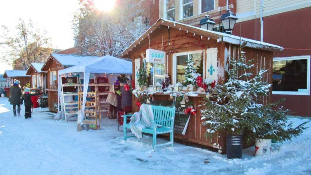 A Christmas market in the snow.