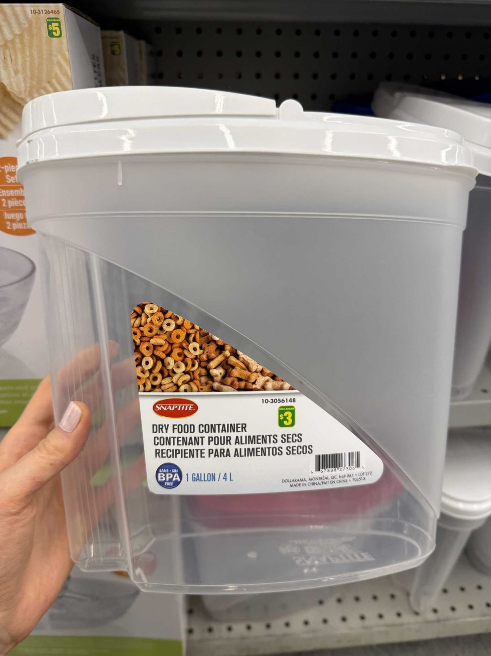 A clear plastic container with a white lid.