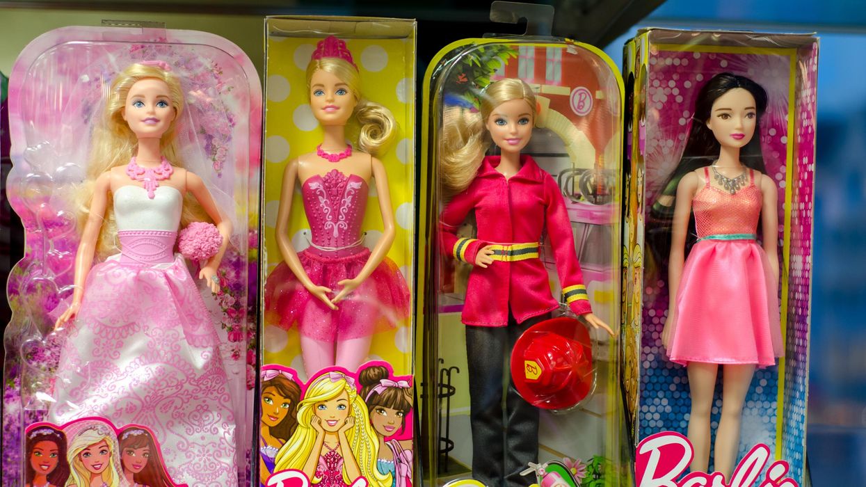 A collection of Barbie dolls.