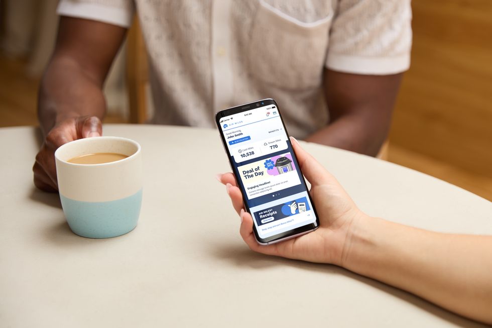 A collector using the AIR MILES app.