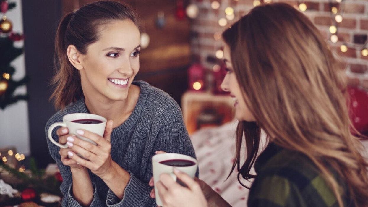 A couple of best friends talking over a cup of tea.