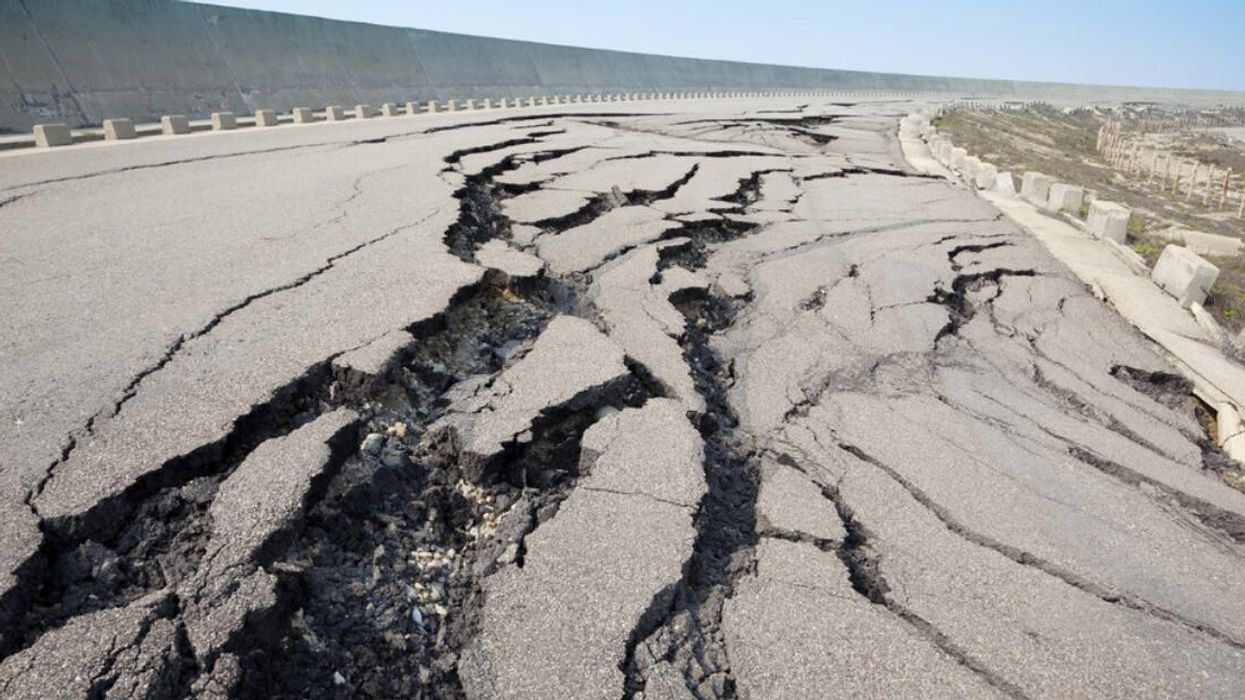 A cracked road after an earthquake.