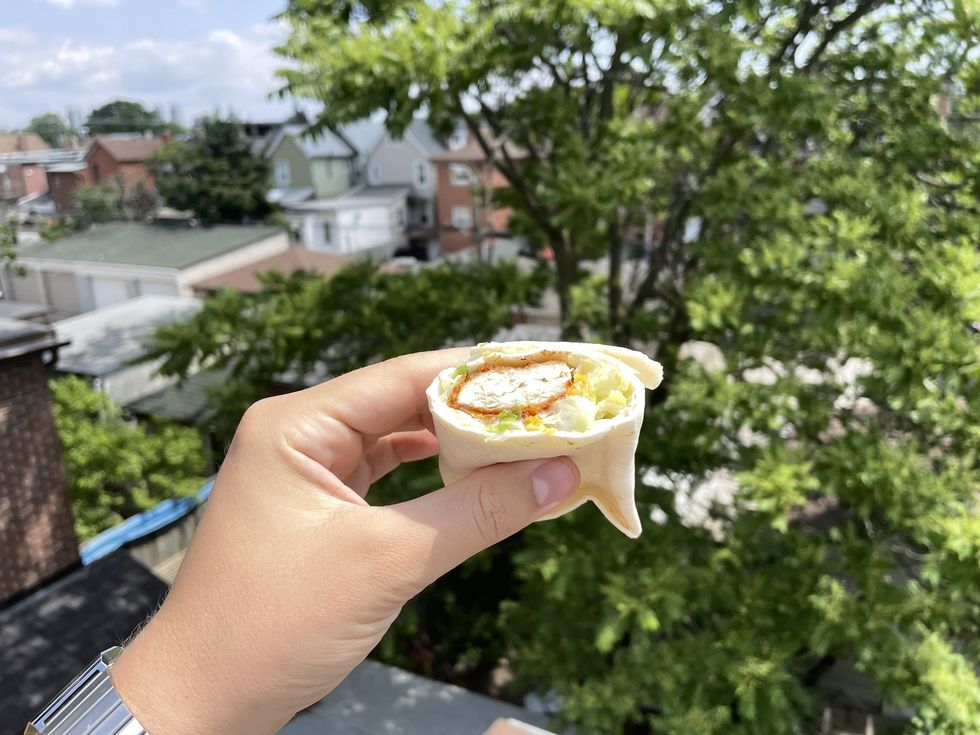 A cross section of the McDonald's Ranch Chicken Snack Wrap.