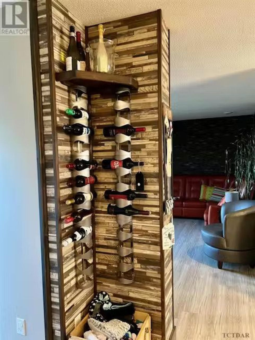 A custom wine rack inside of Toronto's cheapest home for sale.