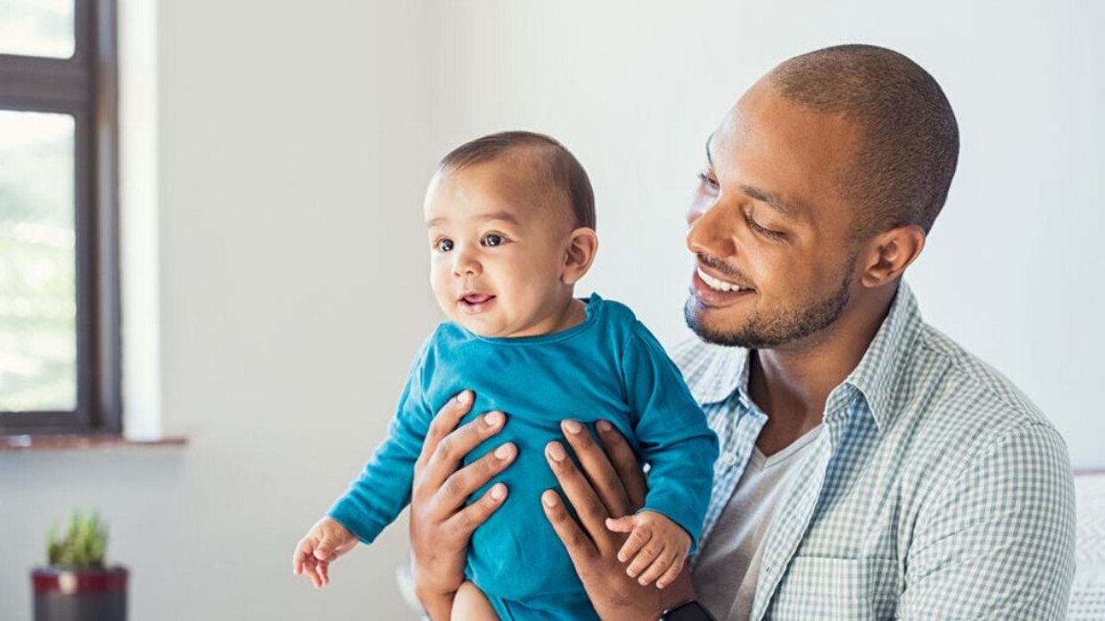 A dad and his baby.