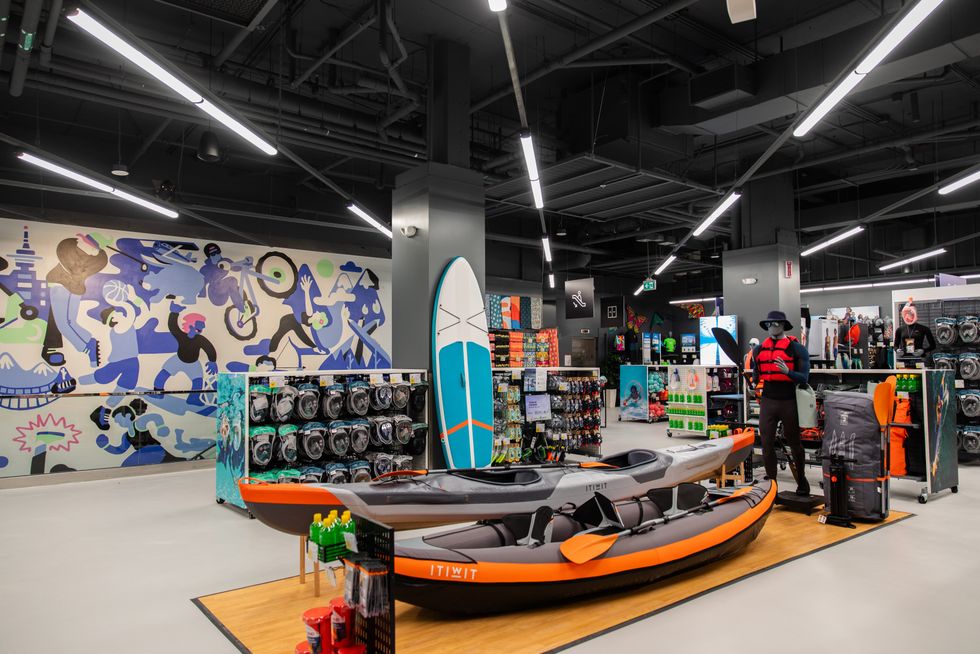 A display of kayaks, paddleboards and snorkels at Decathlon's Vancouver store.