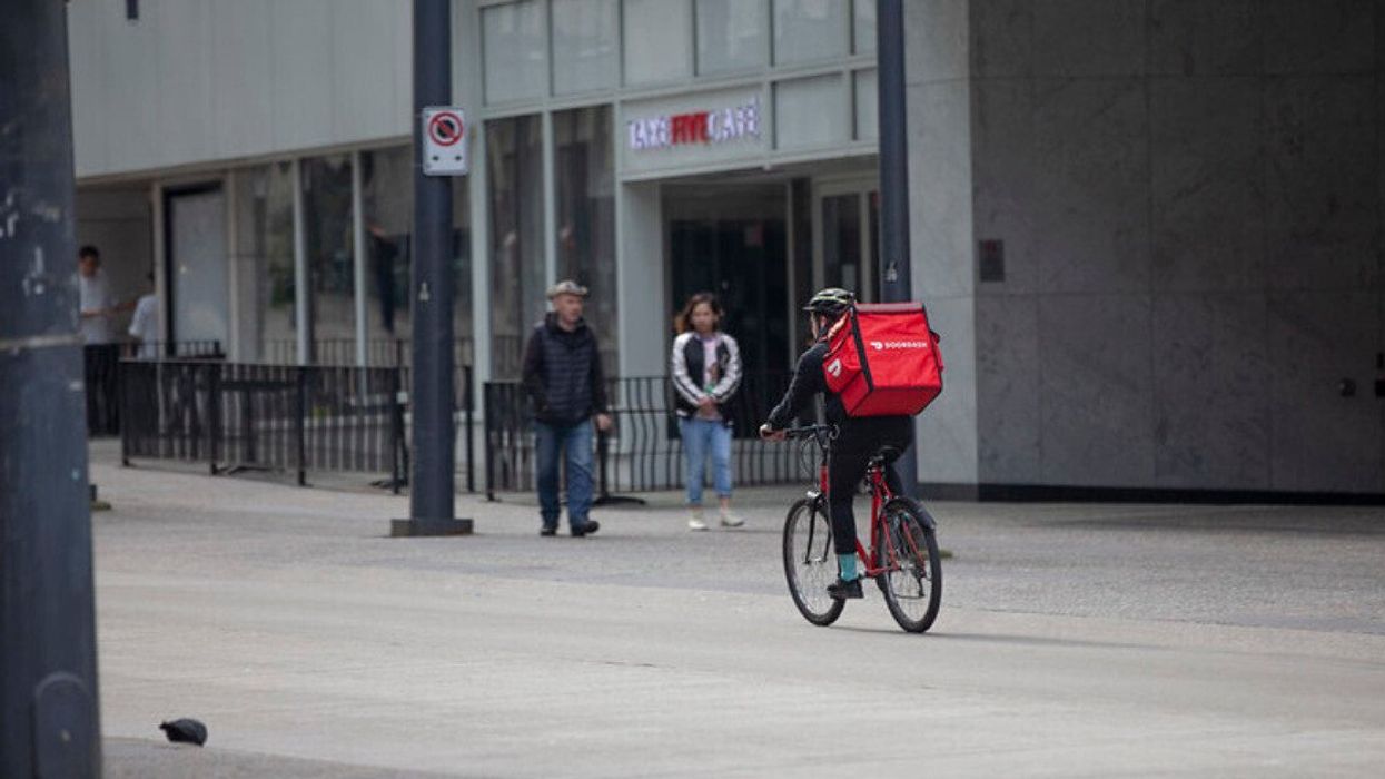 A DoorDash delivery person