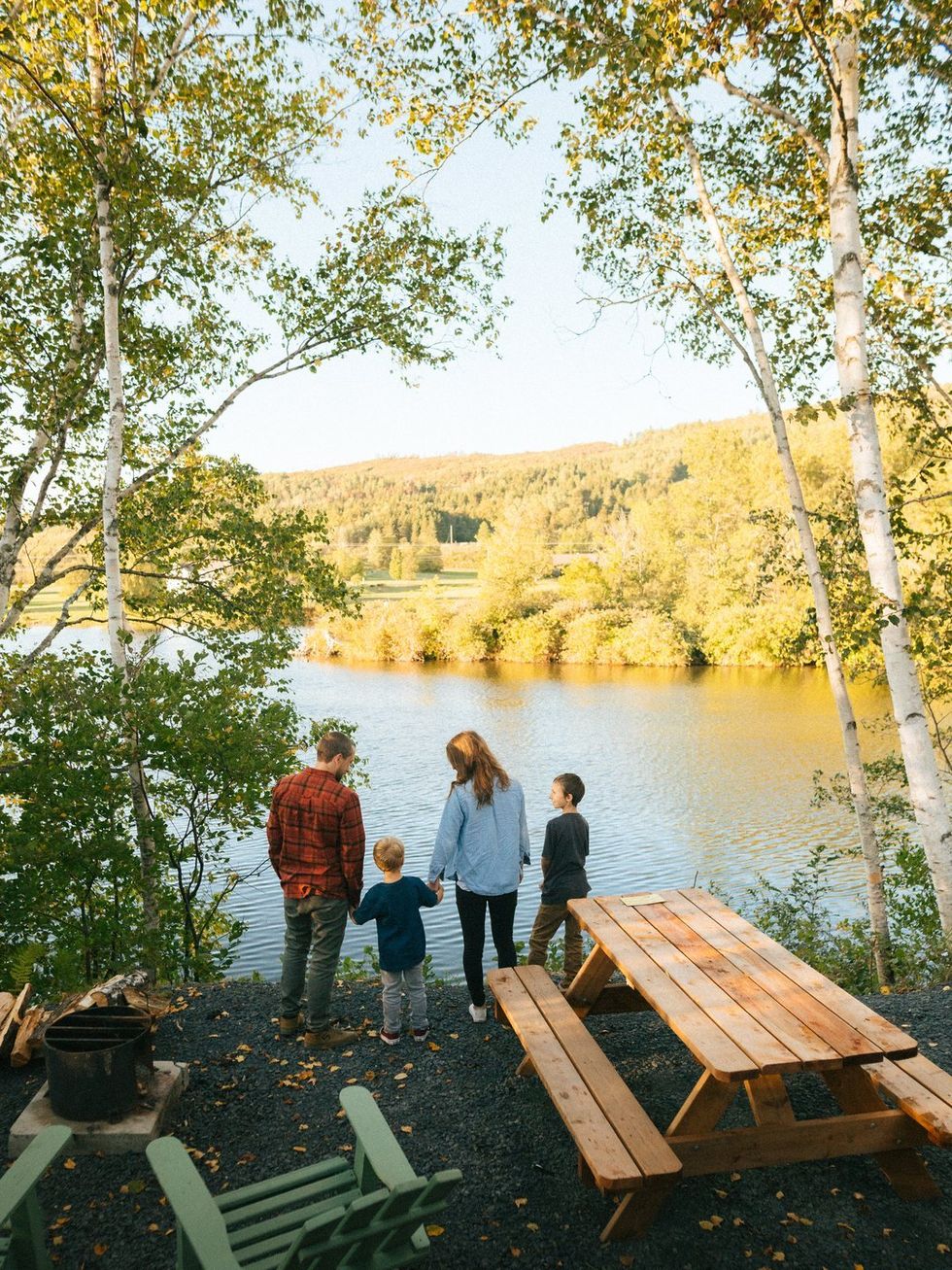A family at a campsite in R\u00e9publique Provincial Park.