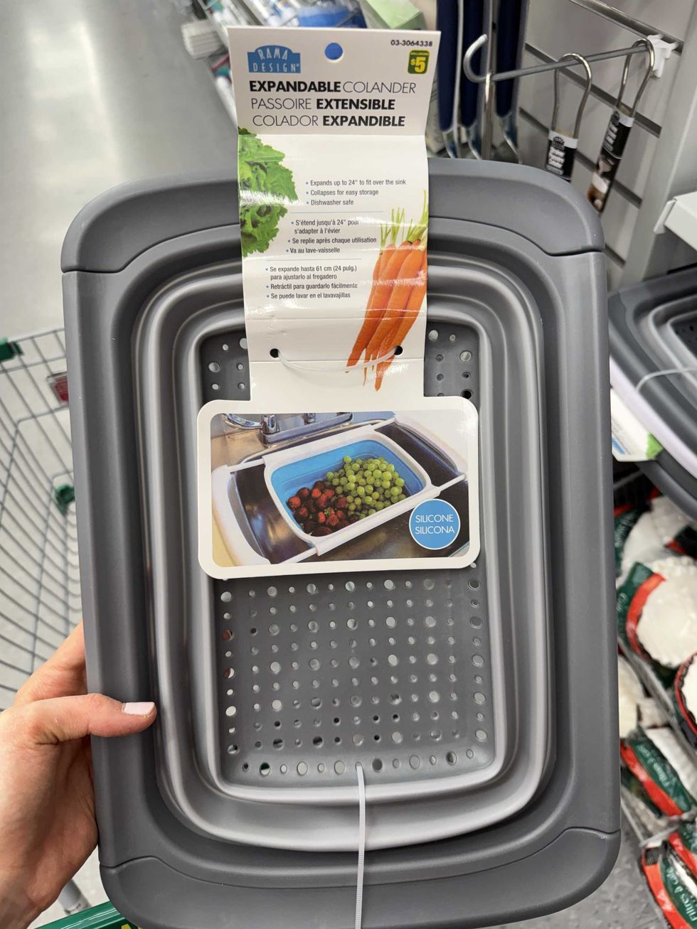 A grey rectangle with holes in the middle and a label that reads expandable colander.