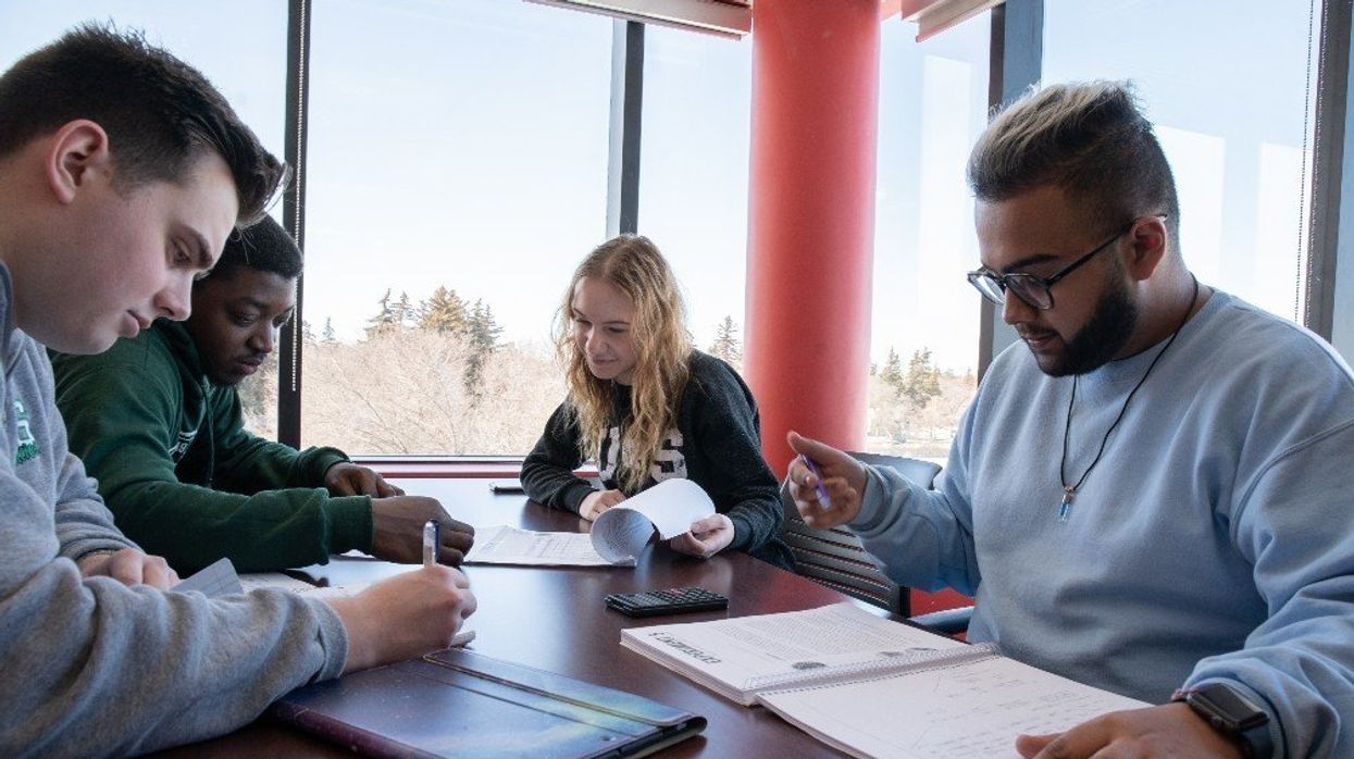 A group of university students studying.