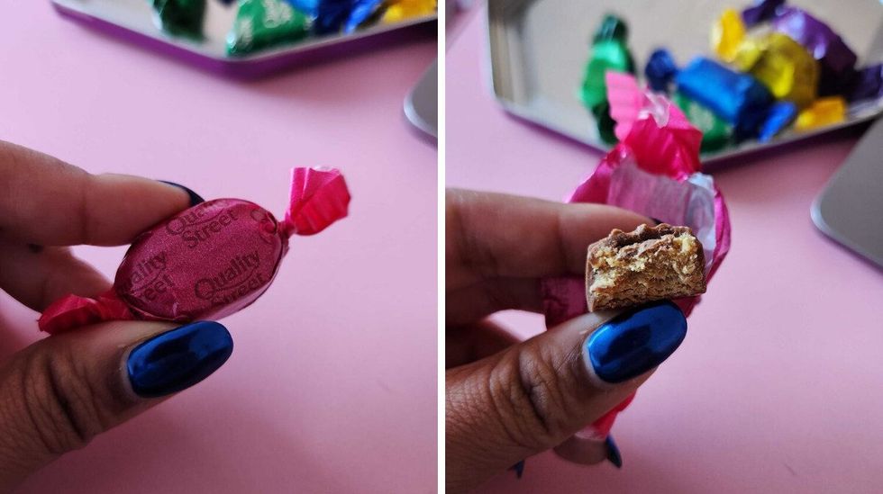 A hand with blue nails holding a chocolate in a pink wrapper. Right: A hand with blue nails holding a chocolate with a bite taken out of it.