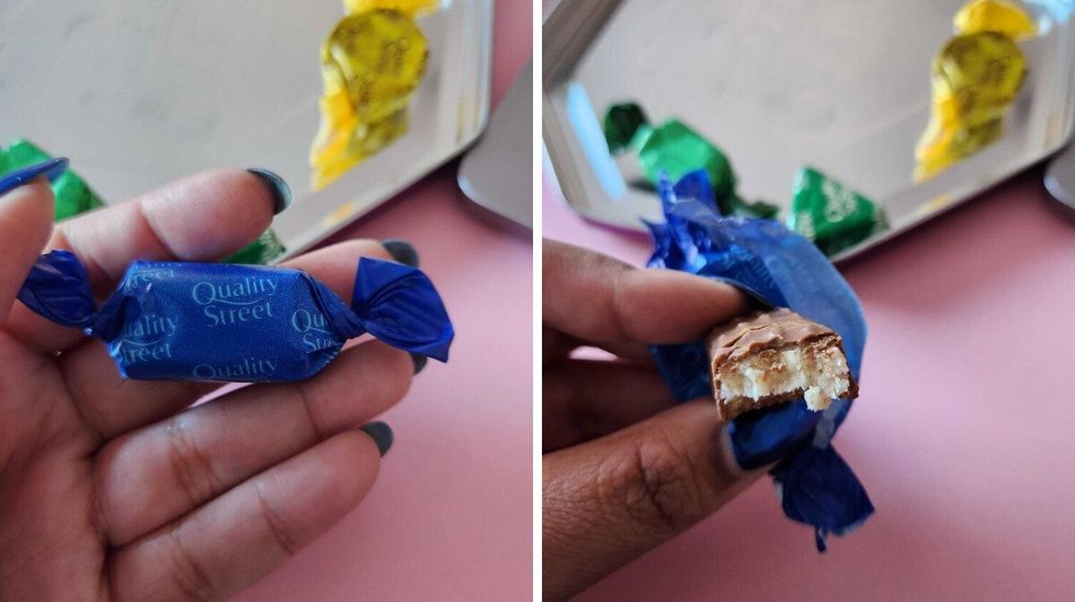A hand with blue nails holding a chocolate in an blue wrapper. Right: A hand with blue nails holding a chocolate with a bite taken out of it with white bits inside of it.
