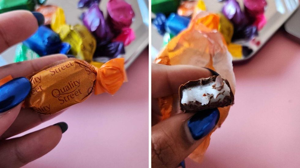 A hand with blue nails holding a chocolate in an orange wrapper. Right: A hand with blue nails holding a chocolate with a bite taken out of it with white cream inside of it..