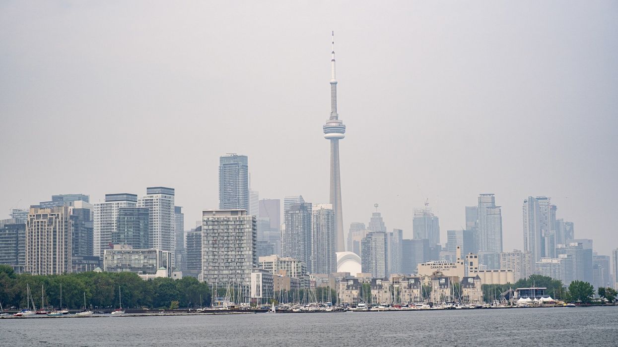 A hazy view of Downtown Toronto due to forest fire smoke.
