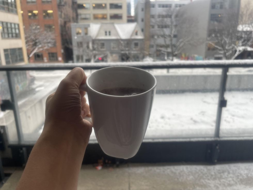 A hot chocolate with a snowy backdrop.