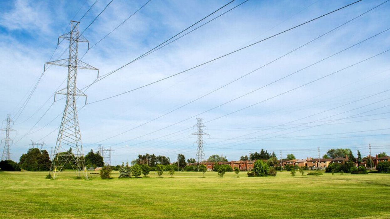 A hydro tower in a suburban neighbourhood.