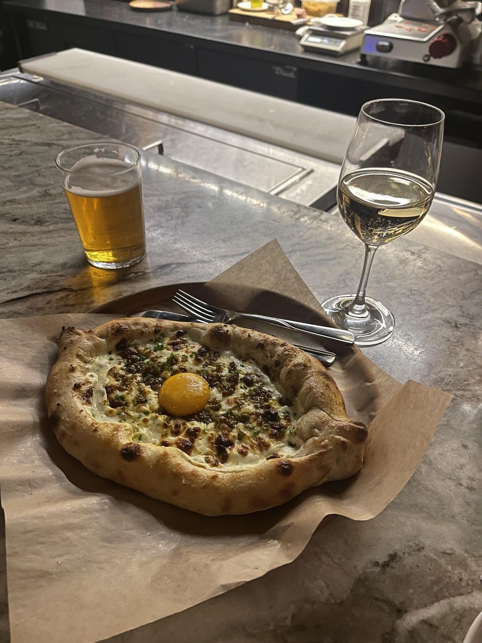 A khachapuri (Georgian flat bread) at A1 Cafe.