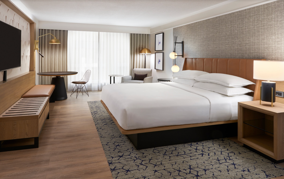 A king guest room at the Sheraton Gateway Hotel.