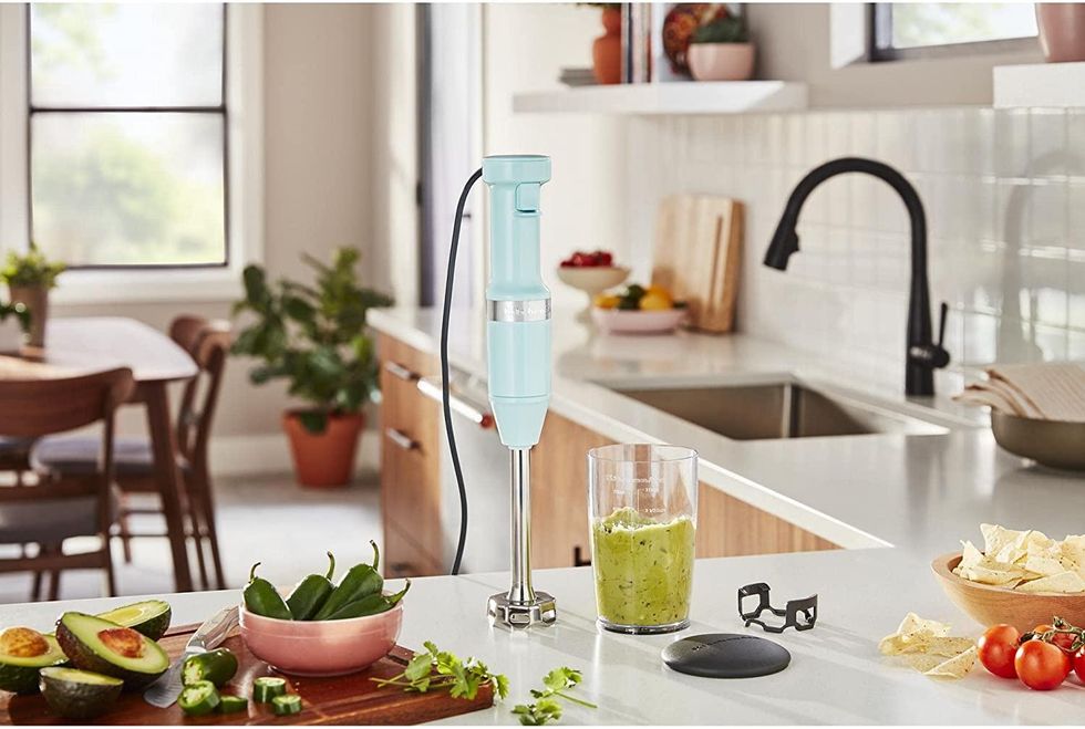 A KitchenAid blender in a kitchen.
