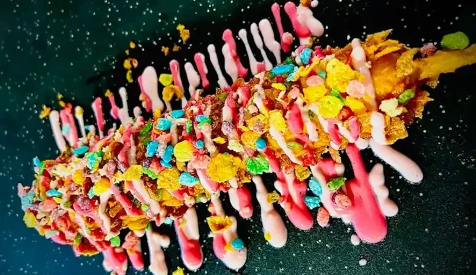 A Korean dog with cereal topping.